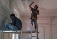 Craftsmen decorate the walls and ceiling with stucco Wall decoration with stucco
