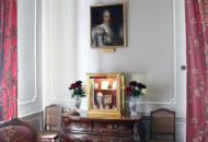 Stucco molding brings variety and elegance to strict interior decoration Stucco molding in the interior of the living room in gray tones