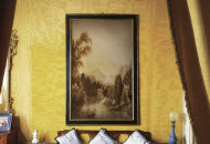 Elegant, light painting decorated the walls of the living room. Animalistic grotesque in monochrome tones gave the room an exclusive decor Painting in the style of animalistic grotesque in the interior of the living room