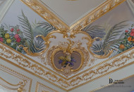 Combination of stucco gilded decor with polychrome painting Baroque painting of the corner element of the plaster molding