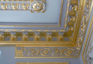 Architectural corner gilded with gold leaf Gilding and painting in a classic interior