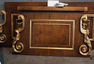 Fragment of wood carving with gilding