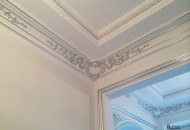 The interior is decorated with elements of silver leaf Varnishing of the stucco surface before gilding