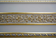 Architectural corner gilded with gold leaf Glimpse in gilding