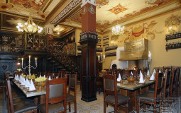 The restaurant is decorated with intricate ceiling and wall paintings, dark bog oak panels and light Egyptian tiles Renaissance family restaurant