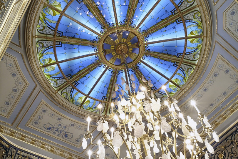 The subtle pattern of the stained-glass ceiling echoes the painting of the walls, vaults and wonderfully decorates the interior of the residence Stained glass ceiling in the residence
