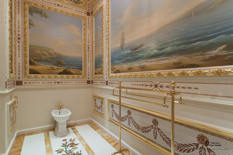 Bathroom in a classic style with painting, framed with gilded stucco Bathroom with painting and gilding stucco