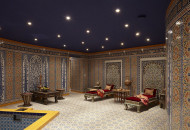 The stylized drawing on the wall, oriental furniture and interior items, the dark blue starry sky gave the hamam palace splendor Richly decorated hammam interior