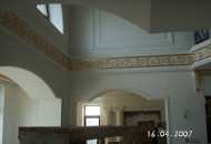 Gilded plaster stucco molding in a fashionable home stucco decoration from plaster stucco in the house