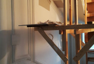 An example of decorating an interior in a classic style with plaster stucco installation of a plaster socket