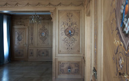 The male office is decorated in a classic style. Boiserie panels with painting and animal design made it exquisitely unique Male office interior with boiserie panels