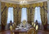In the dining room, an unusual layout of parquet and ceiling decor created a coherent richly decorated interior Baroque dining room with gilded stucco and decorative parquet