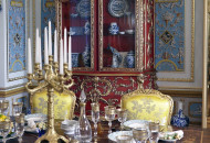 In the dining room, an unusual layout of parquet and ceiling decor created a coherent richly decorated interior Baroque dining room with gilded stucco and decorative parquet