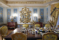 In the dining room, an unusual layout of parquet and ceiling decor created a coherent richly decorated interior Baroque dining room with gilded stucco and decorative parquet